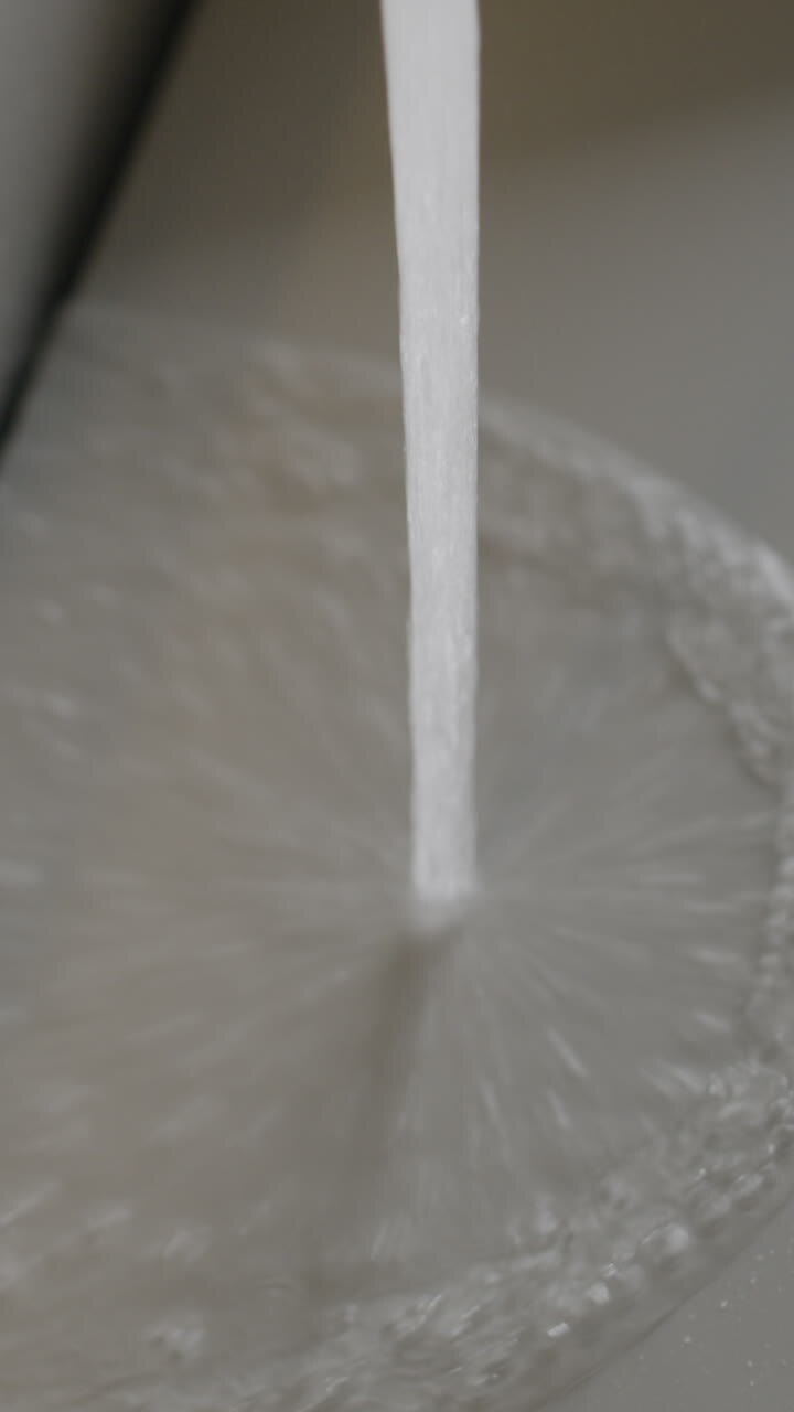 Water flowing from a faucet