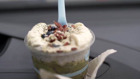 close up video of a green acai bowl