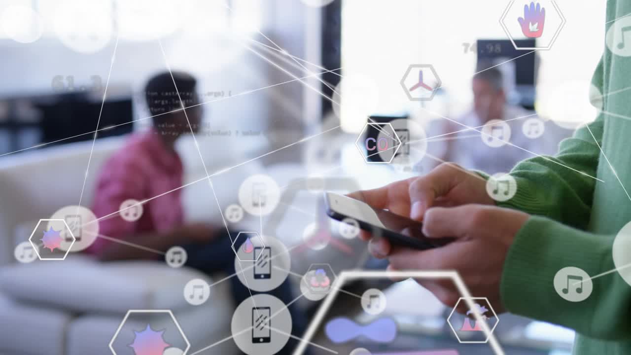 Green-sweater man tapping phone, generating AR hexagon network linking devices for tech demo