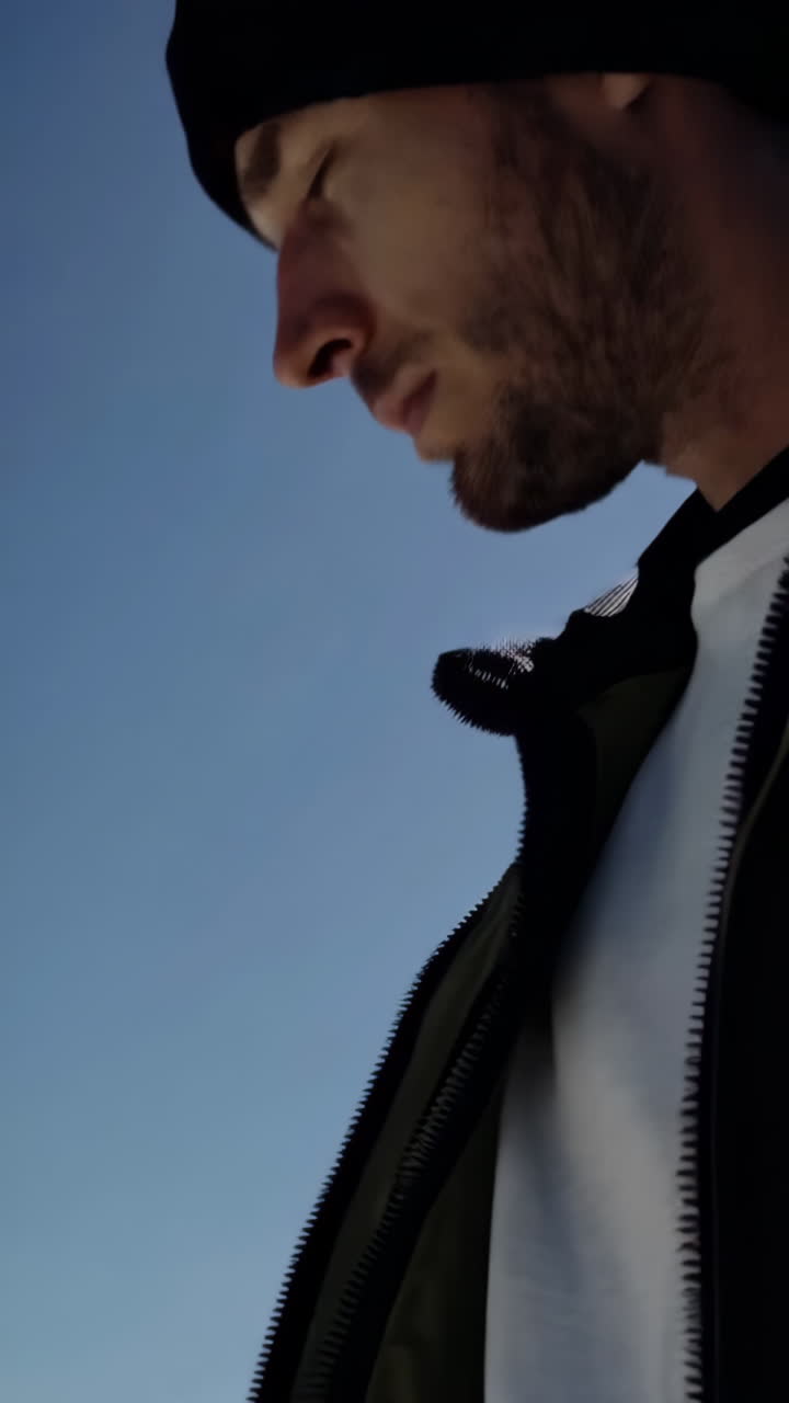 Man with Phone and Book