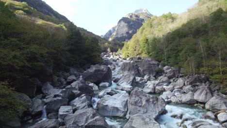 aerial view of wild turquoise mountain river verzasca valley in swiss alps