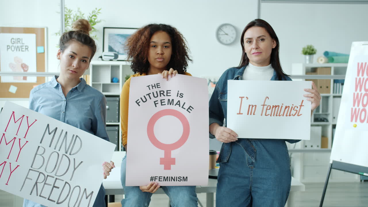Women Holding Protest Posters