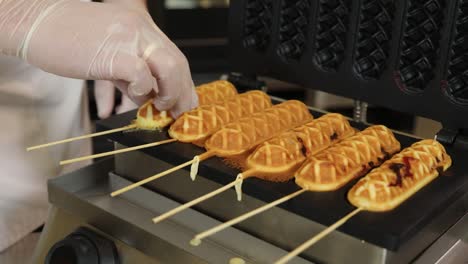 making waffle corn dogs