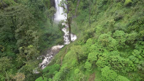 Taking-off-at-Materuni-Waterfall,-Tanzania