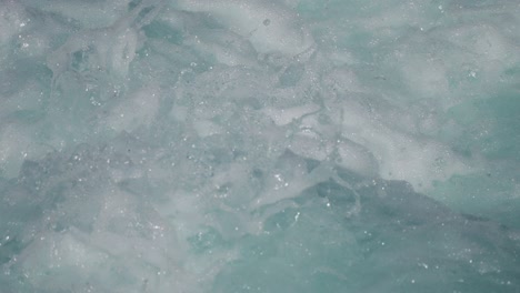 slow motion shot of water flowing through rapids of loen water in norway at daytime