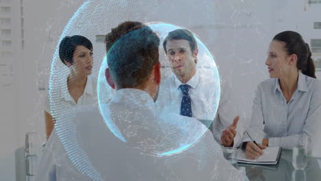 Business professionals discussing around glass table in office, exploring digital globe hologram