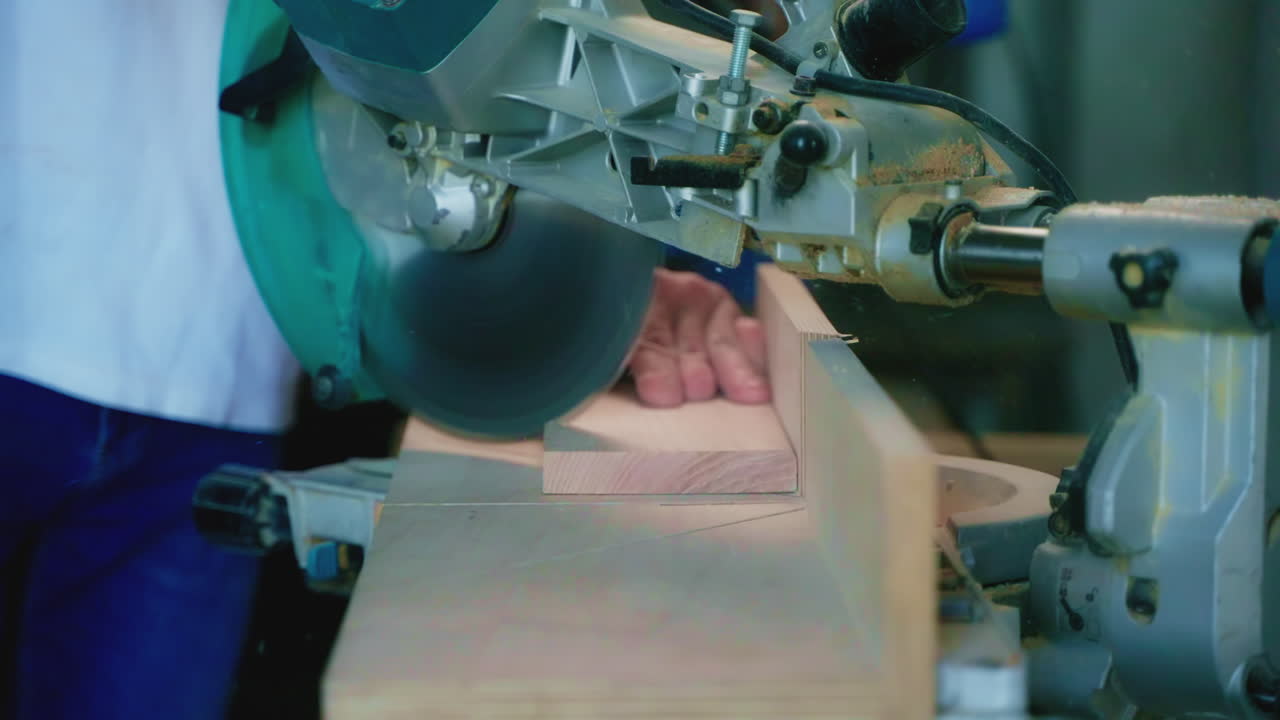 Carpenter using a circular saw to cut wood