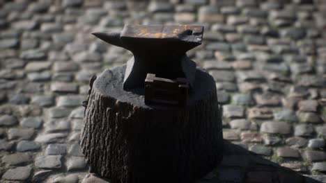 Old-anvil-attached-to-a-stump