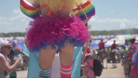 back side of a female performer in a festival