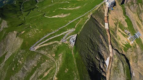 Epic-drone-shot-revealing-Brienzer-Rothorn-mountain-hiking-trail-in-Emmental-Alps-with-Lake-Brienz-in-view,-Switzerland,-Europe