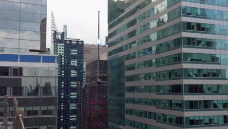 Aerial-birds-eye-top-view-of-tall-office-of-apartment-buildings