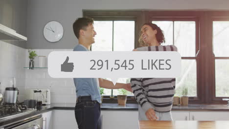 people dancing in kitchen with 691,937 likes animation over them