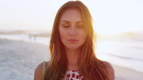 Face,-summer-and-sunset-with-a-woman-on-the-beach