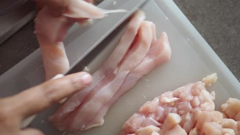 preparing raw chicken breast