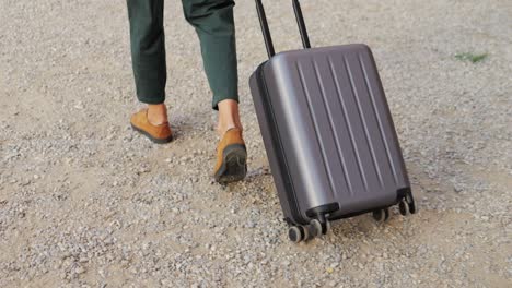 person walking with luggage