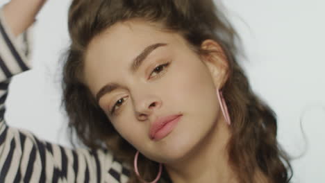 happy woman with natural makeup in studio