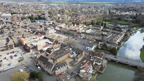 St-Neots-town-in-Cambridgeshire-UK-pull-back-over-river-Ouse-Aerial-footage