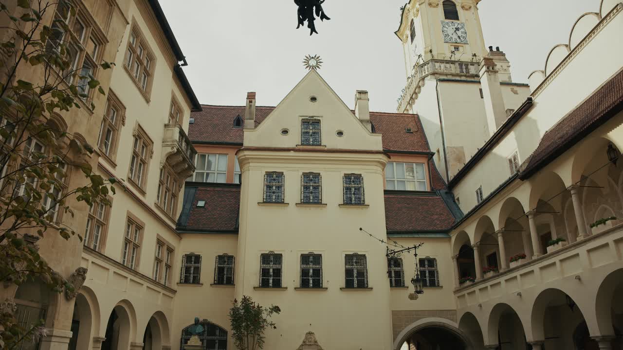 Majestic Bratislava Castle illuminated by the warm hues of a setting sun