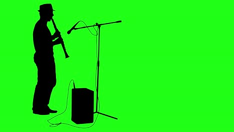 silhouette musician plays the clarinet. green screen footage. 4k animation.