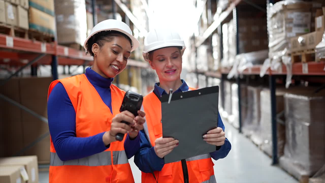 Warehouse workers with safety gear and tools