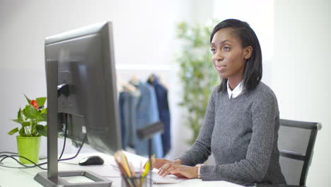 young female professional working at desk 3