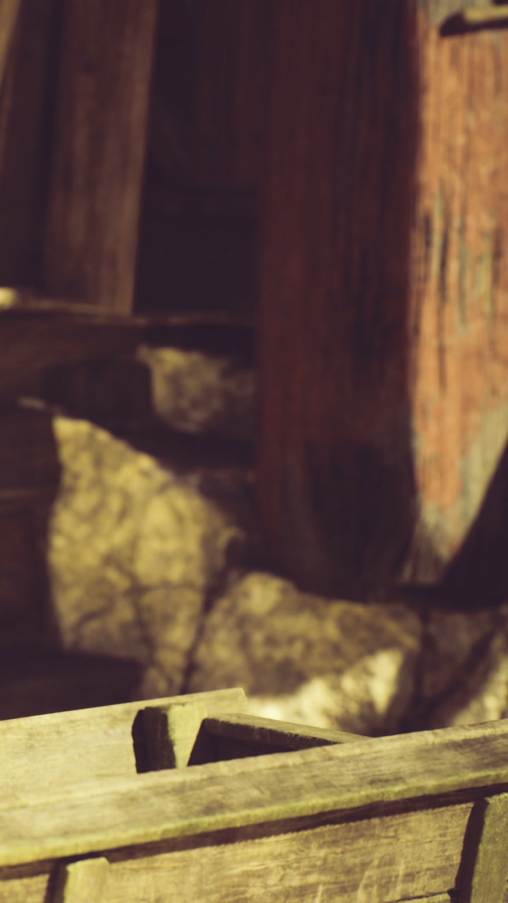 Wooden textures and shadows create an enchanting atmosphere in rustic setting