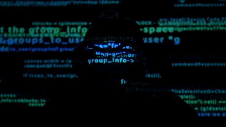 Hacker and programming code