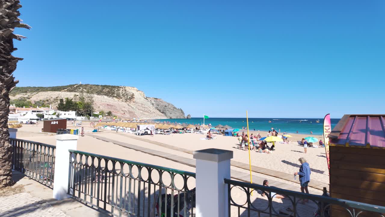 Beautiful beach with clear blue sky and palm trees