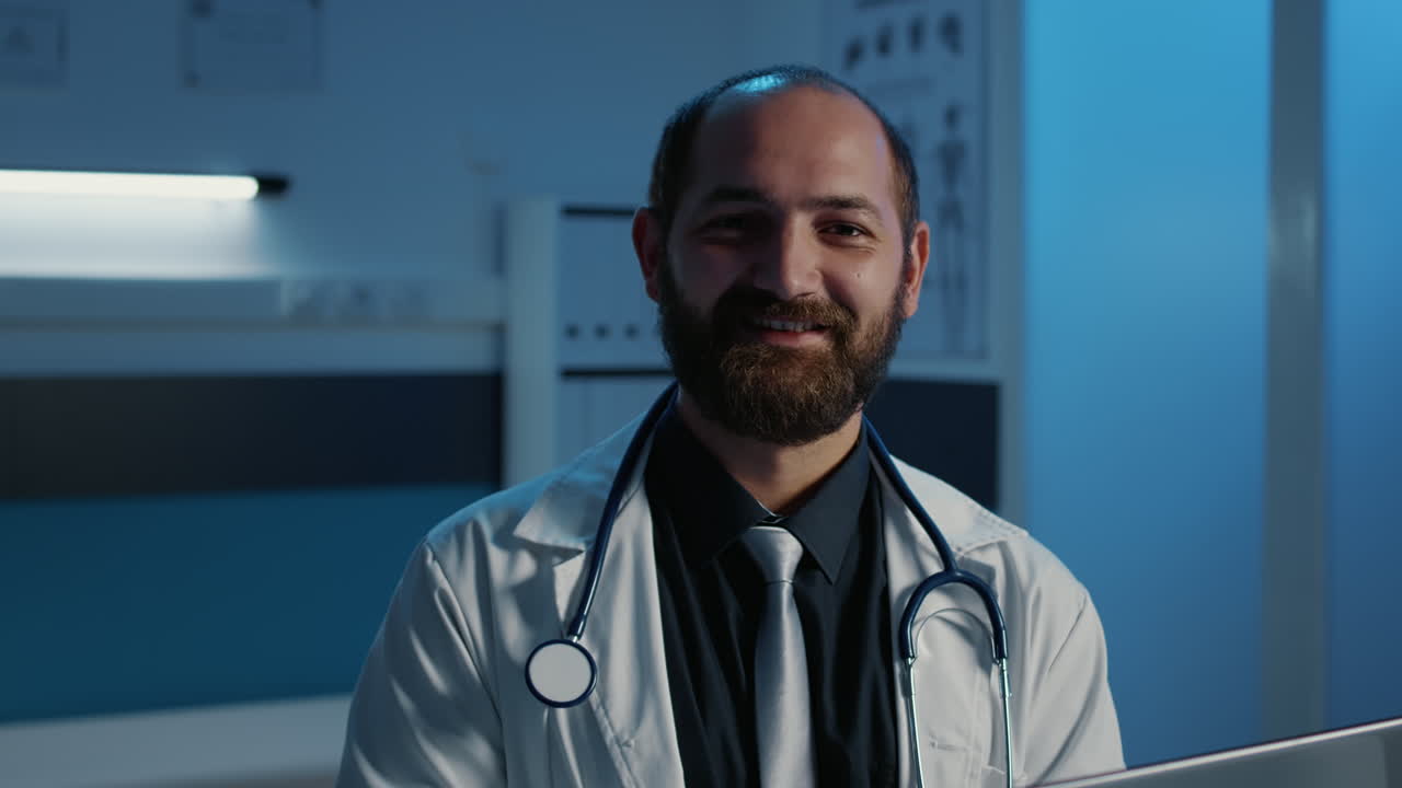 Doctor using laptop in medical office