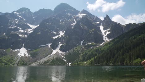 still shot of the mountains and the lake of morskie oko in zakopane, poland