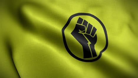 angled view of the fist of powerflag flapping in hd