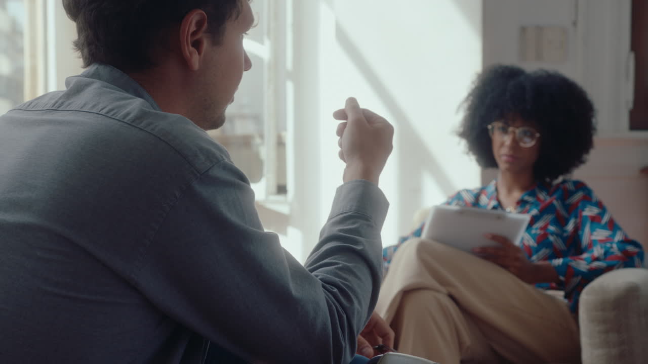 Stressed Man Complaining to Psychologist on Therapy Session
