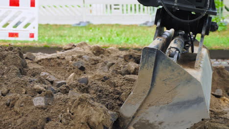 excavator working on road construction site