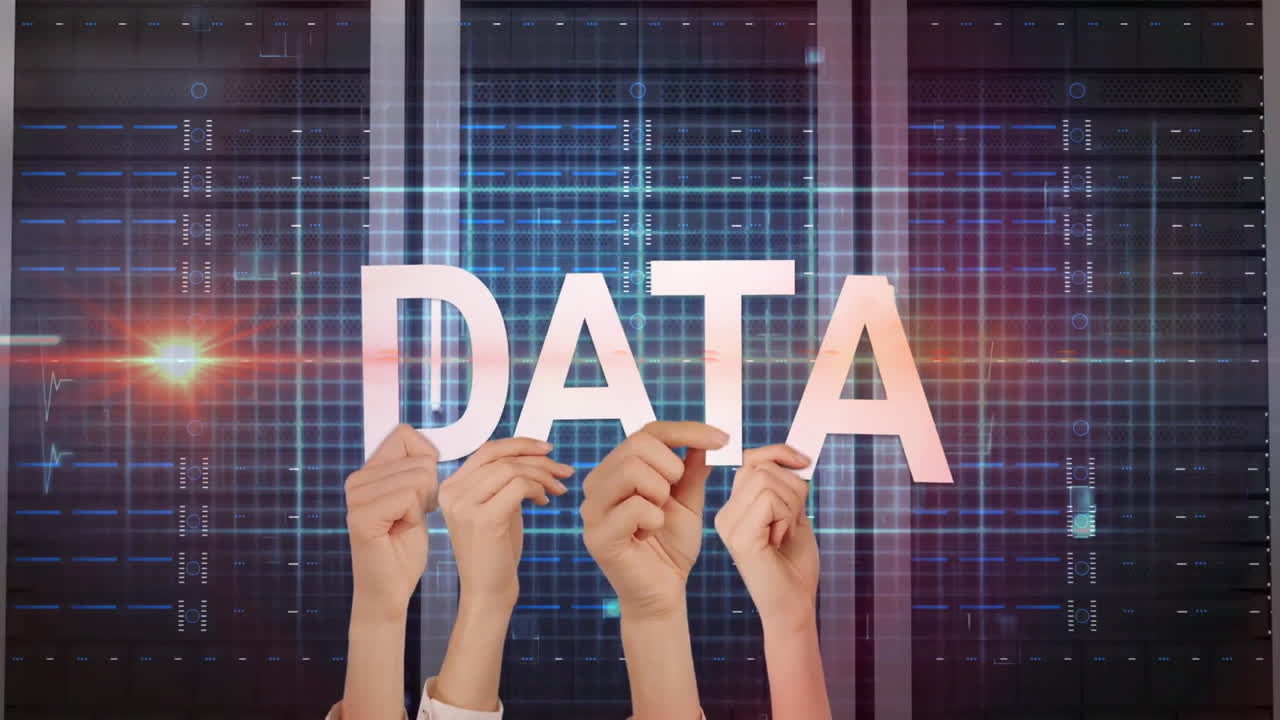 Hands holding animation of DATA text over digital grid background