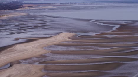 aerial drone over river delta and marsh in the netherlands