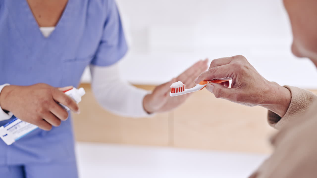 Hands, brushing teeth or caregiver helping senior
