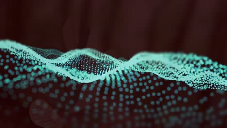 animation of moving wave of dots over black background