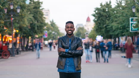 smiling man in city street