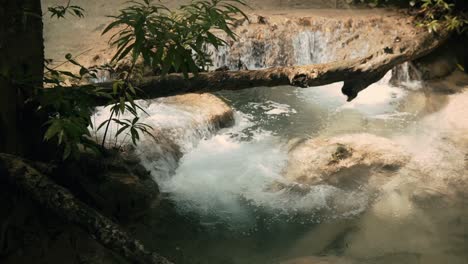 beautiful slow motion shot erawan waterfall in national park in thailand