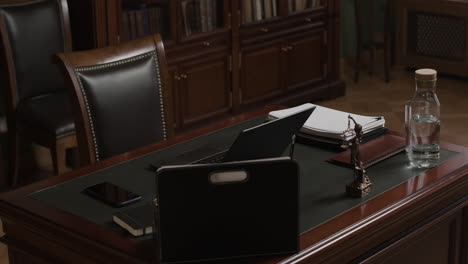elegant office workspace with laptop and documents