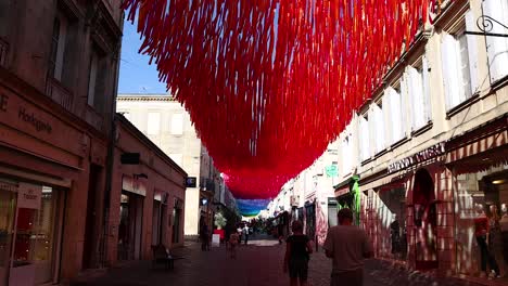 vibrant overhead decorations in a bustling street