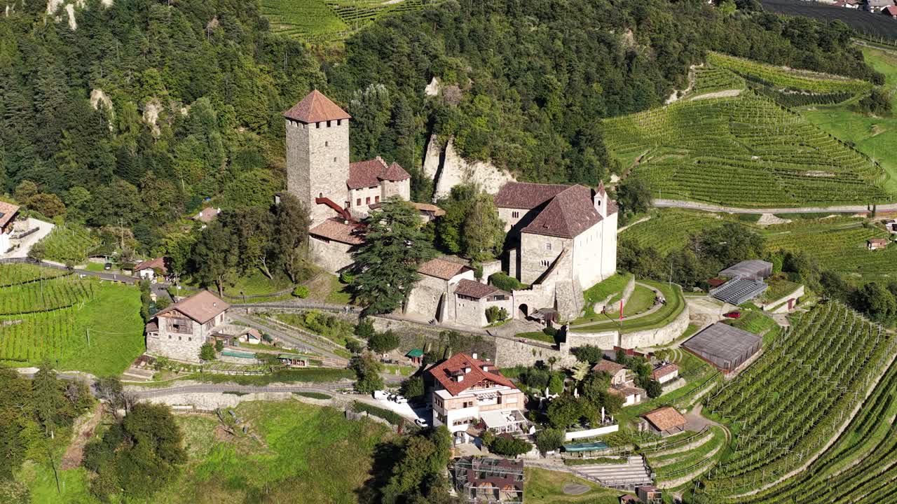 Tyrol Castle Schloss Tirol or Castel Tirolo, in South Tyrol, Italy, aerial video