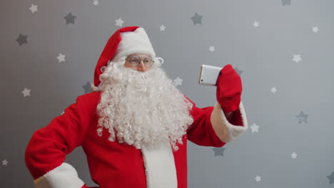 santa claus tomando una selfie