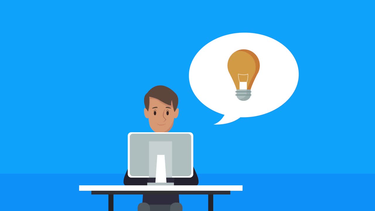 young man using desktop with bulb
