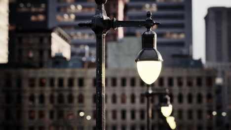 a row of streetlights in a city at night