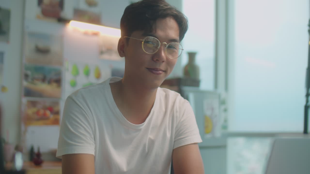 Portrait of Smiling Asian Designer in Art Studio