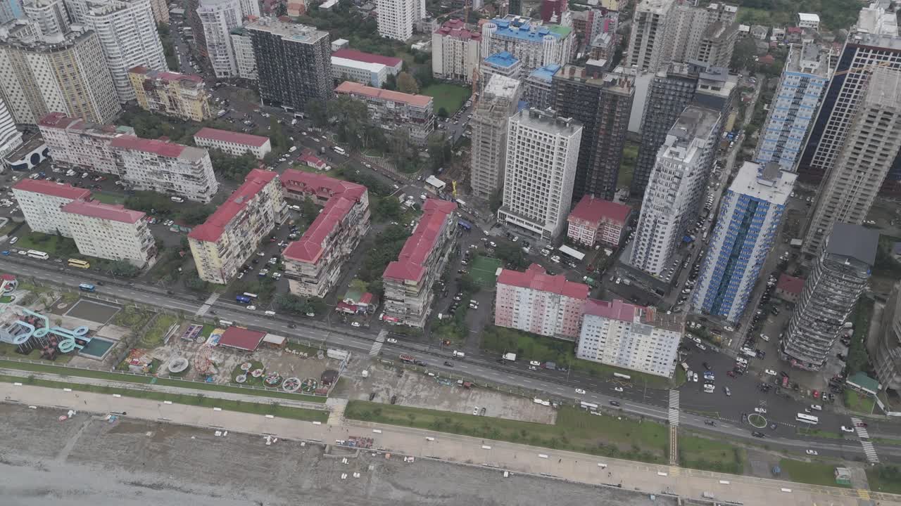Cinematic daytime drone footage of Batumi skyline and skyscrapers.