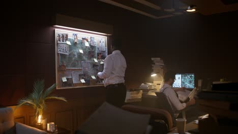 detectives reviewing evidence