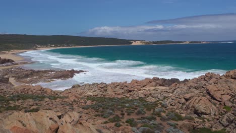 amazing rocky coast of margaret river with turquoise clear water breaking against the rock formation