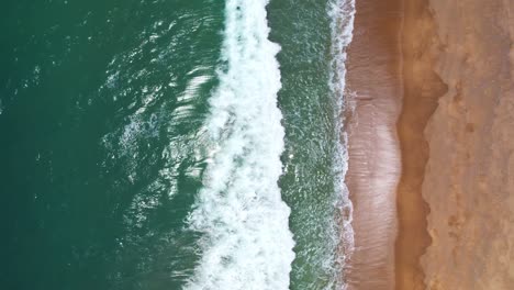 sea waves and beautiful sand beach high quality video bird's eye view